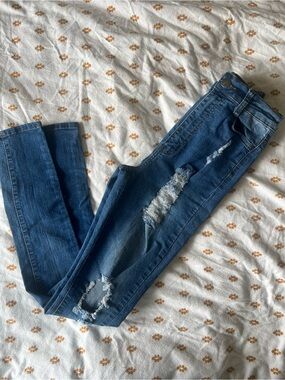Women’s Mid-Blue Distressed Skinny Jeans